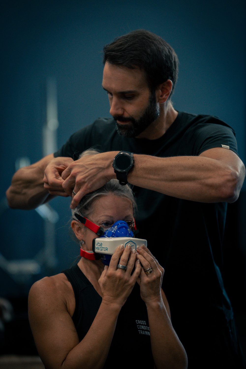 Dr. Troha fitting the metabolic analyzer before a test