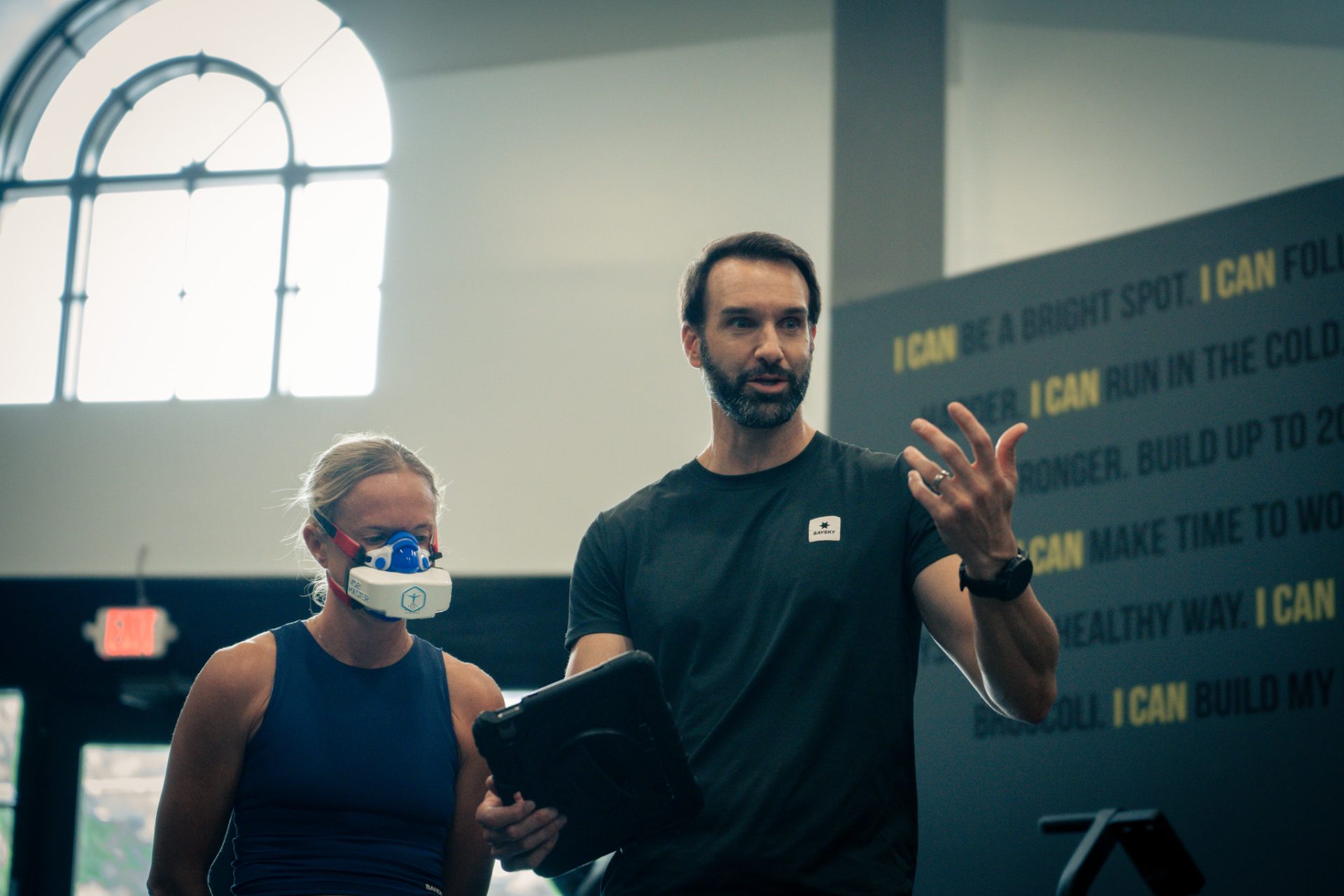 Dr. Troha in conversation with a client after testing
